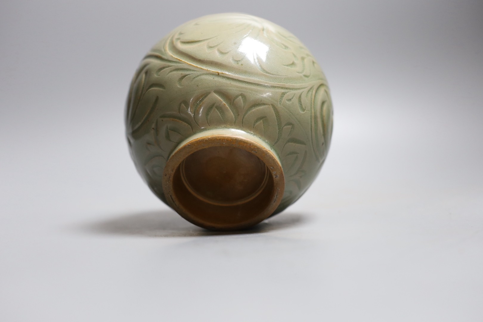 A Chinese celadon globular jar, 12cm